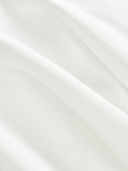 Carbon38 | Asymmetrical Flounce Tennis Skirt in Scuba - White