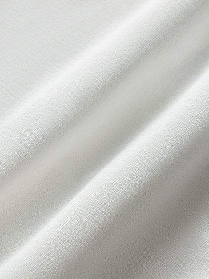 Carbon38 | Tennis Sleeveless Polo - White / Bittersweet
